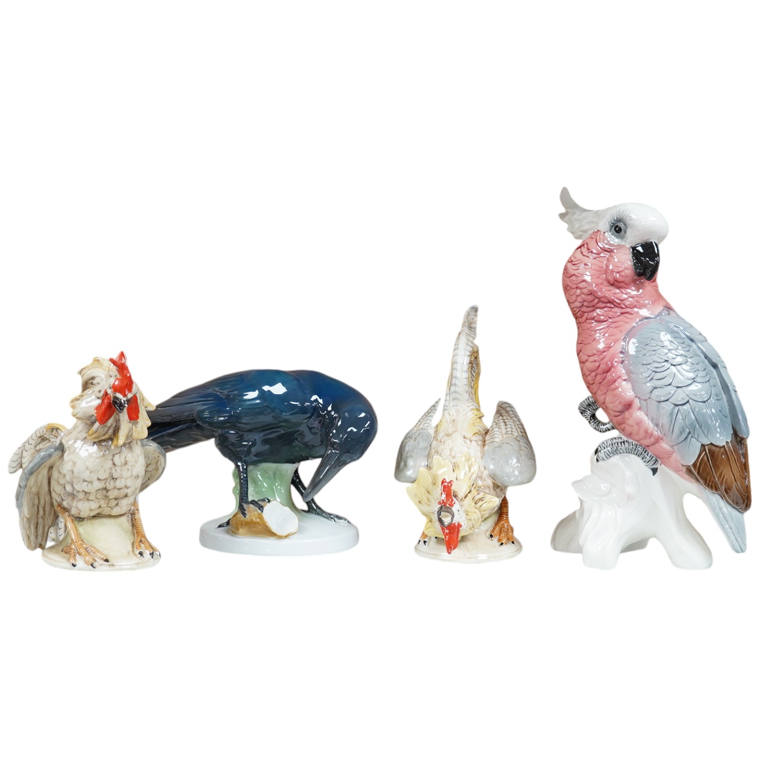 A large Beswick grey parrot, two chickens and a blackbird, parrot 29cm high. Condition - chickens glazing worn